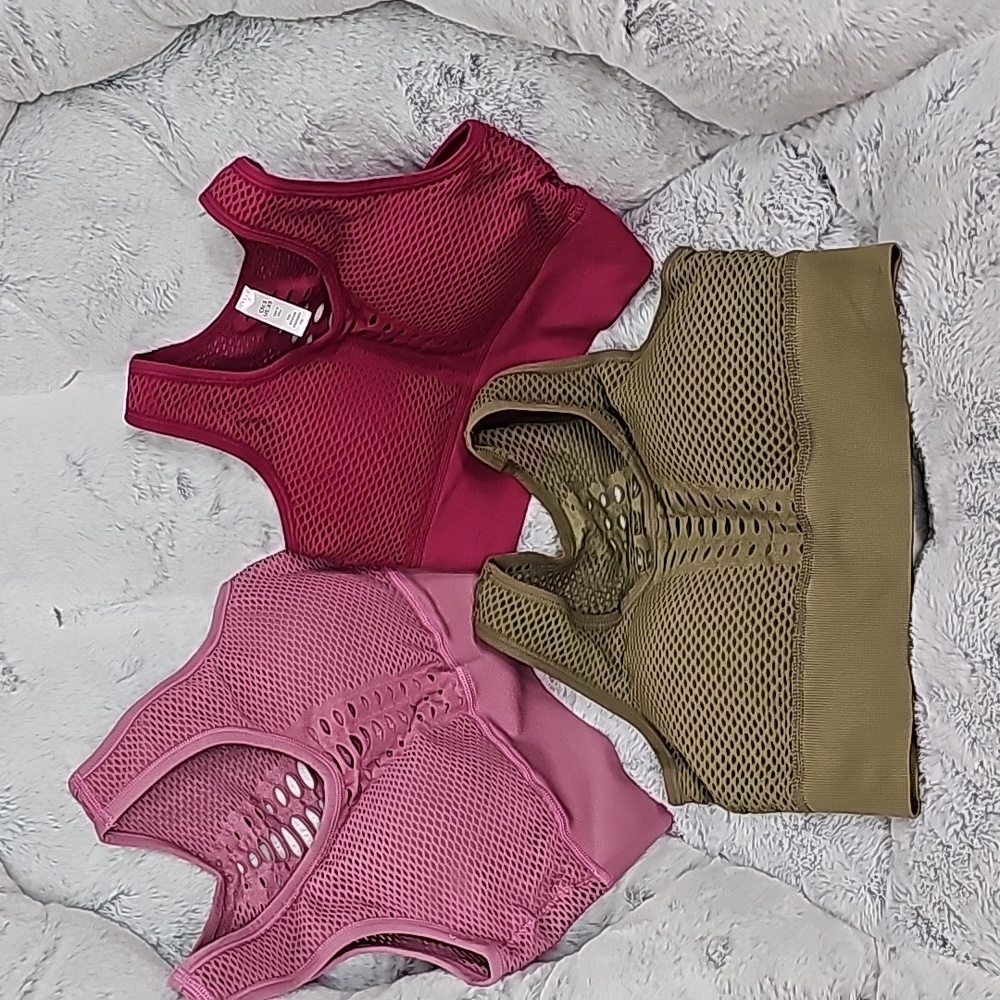3 Halara high impact sports bras . Pine green, burgundy, pink mauve